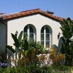 Spanish Colonial arched head windows.