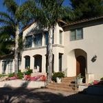 Formal Spanish Colonial of 4,500 sq. ft. on upslope lot designed in the late 90's.